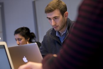 student working at a computer