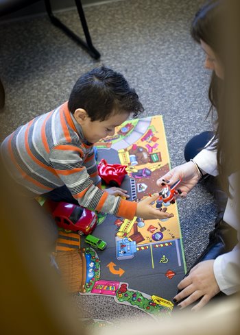 SLP working with a pediatric client