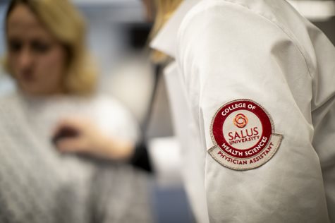 Salus Physician Assistant patch on a white coat