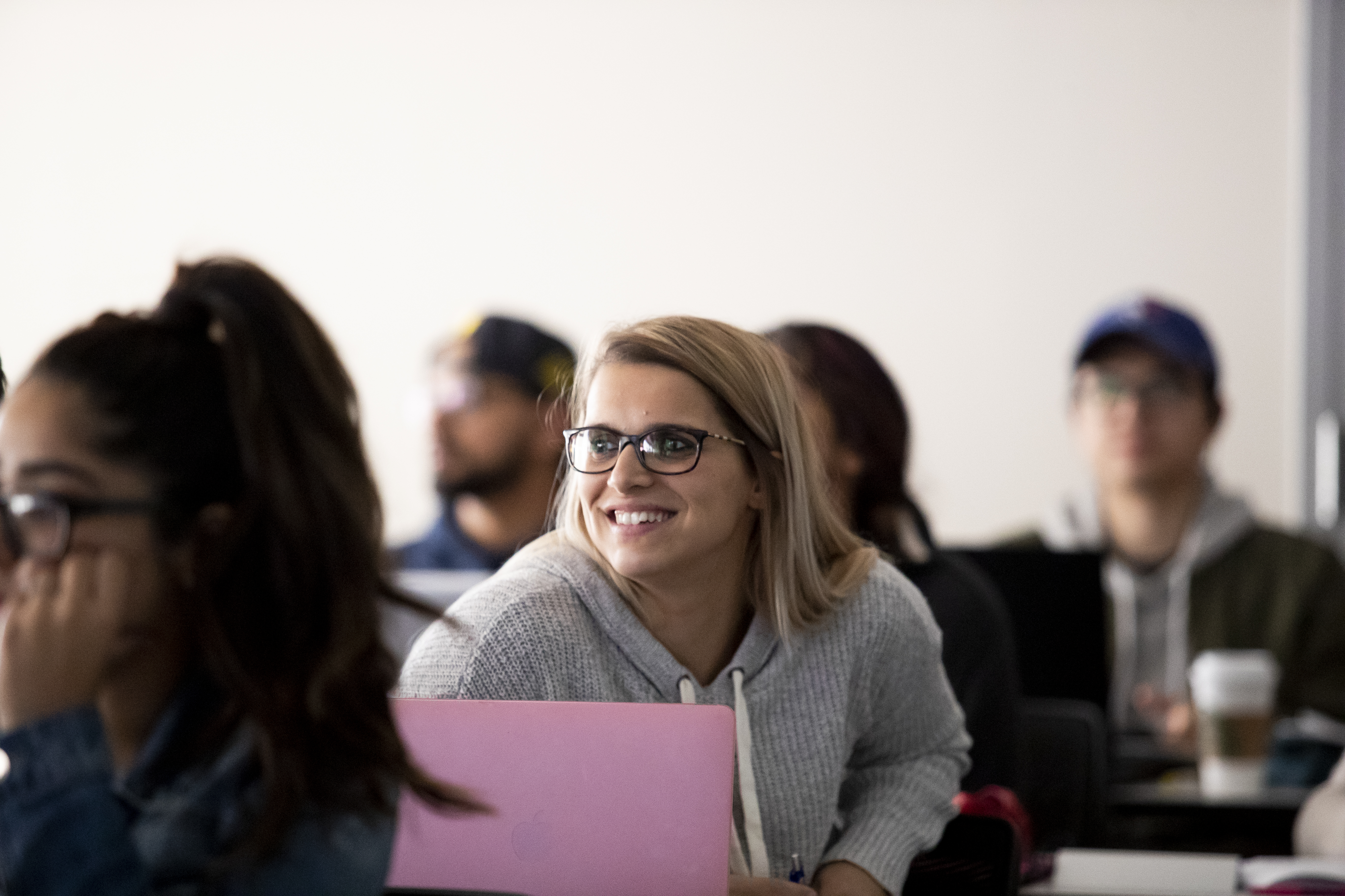 student smiling in class