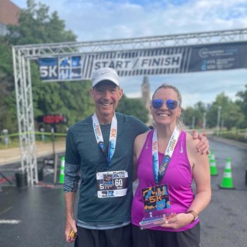 Drs. Mittelman and Coyne smiling at the finish line of the AOA Optometry Cares 5k race.