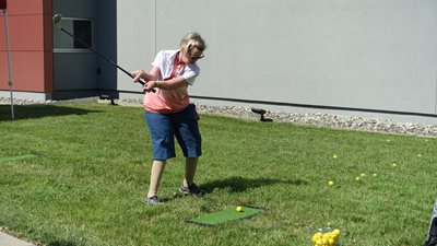 Woman playing golf