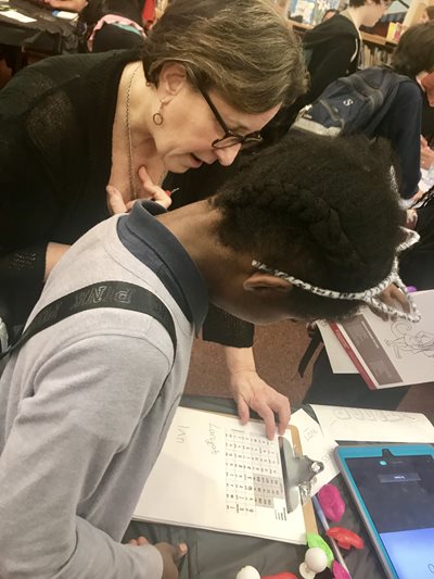 Amy Lustig working with a pediatric patient