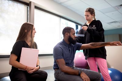 OT students with young patient