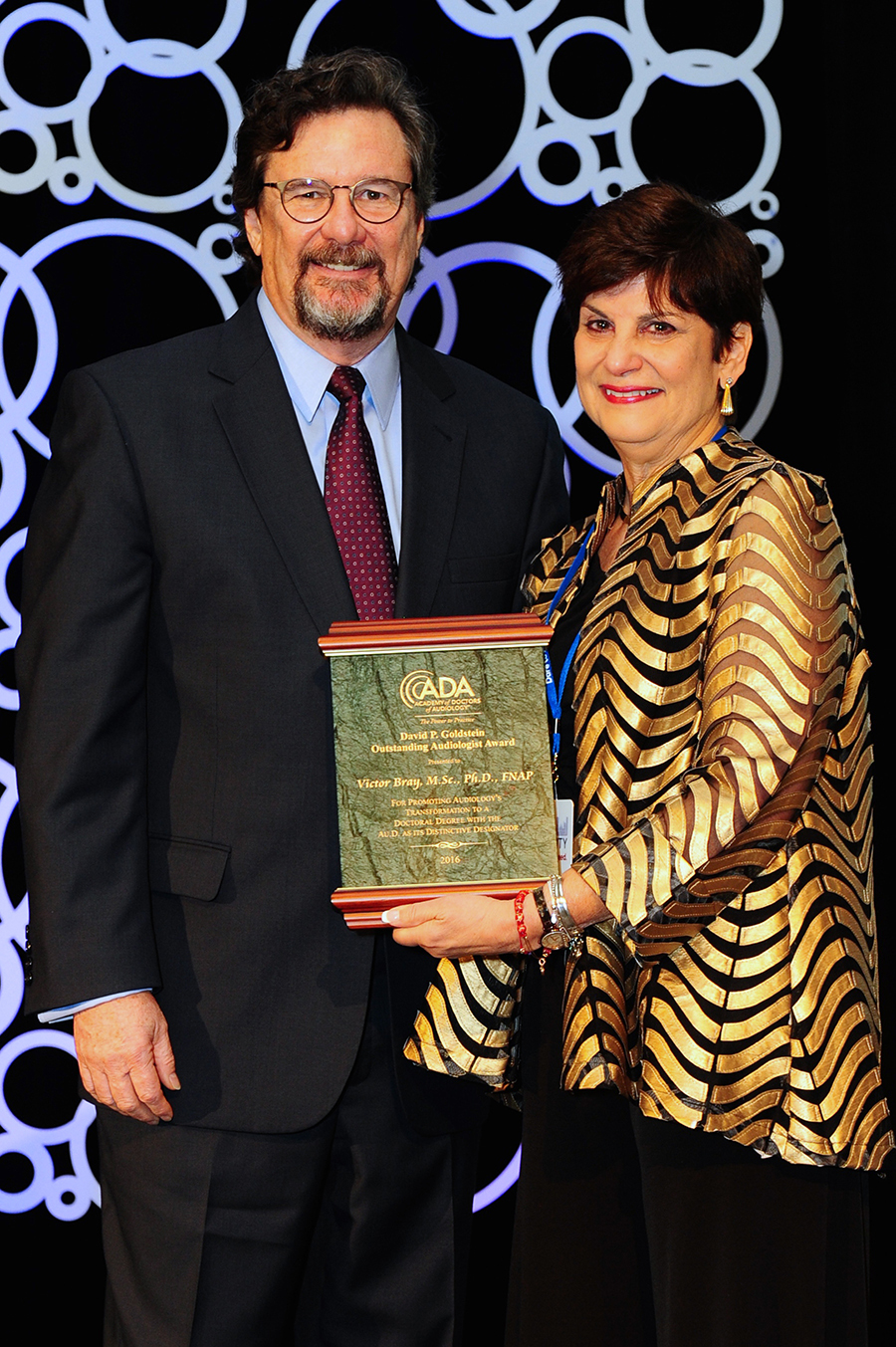 Dr. Bray receiving award