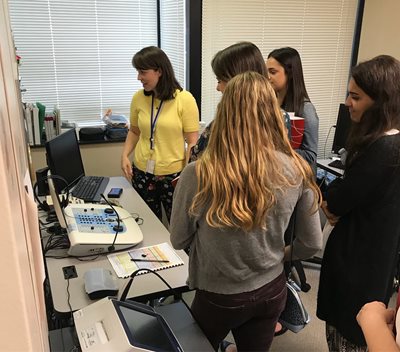 Audiology students and faculty in lab