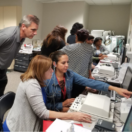 audiology students using audiometers during summer workshops