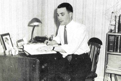 Dr. Bernard Mallinger at his desk while a student at PCO