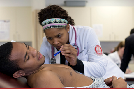 Brittney Hamlett working with a patient