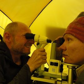 Dr. Michael Baertschi performs an eye exam