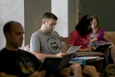 Student looking at papers