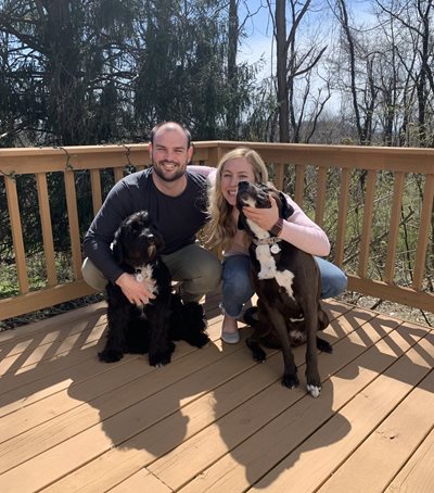 Christin DeMoss, her husband and their dogs