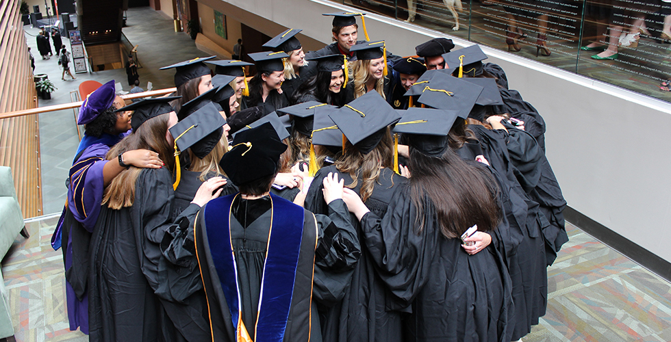 grads at commencement