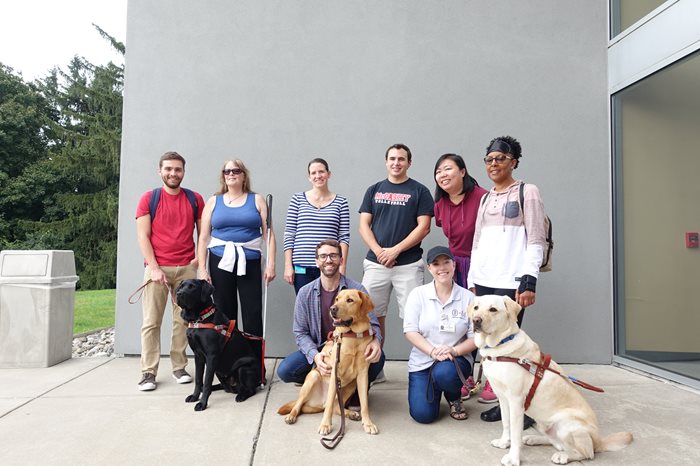 O&M students group photo with guide dogs