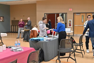 PCO student talking with an employer at the career fair