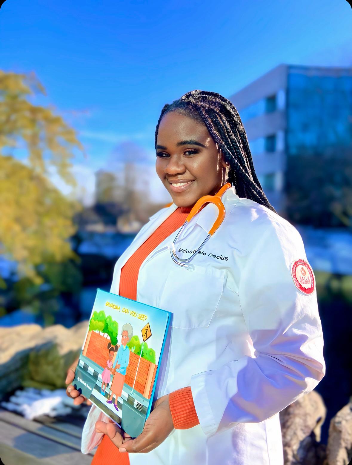 Edesthele holding her book