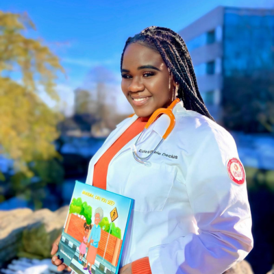 Edesthele holding her book