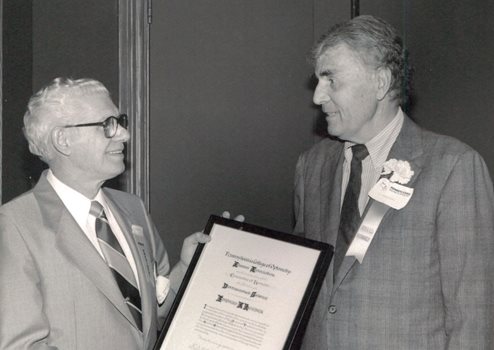 Edward Hueber receiving an award