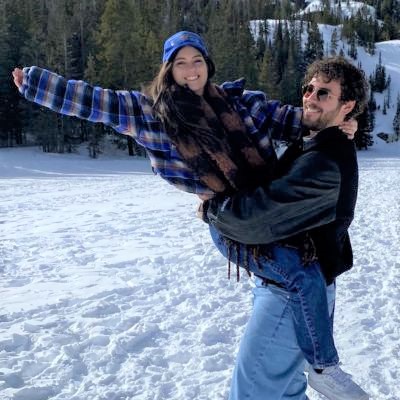 Emily Hamilton and boyfriend in the snow covered mountains thumbnail