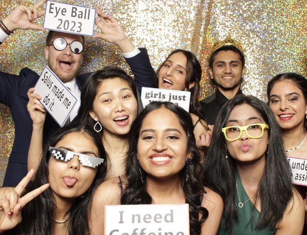 a group of students at the photo booth at the Eyeball