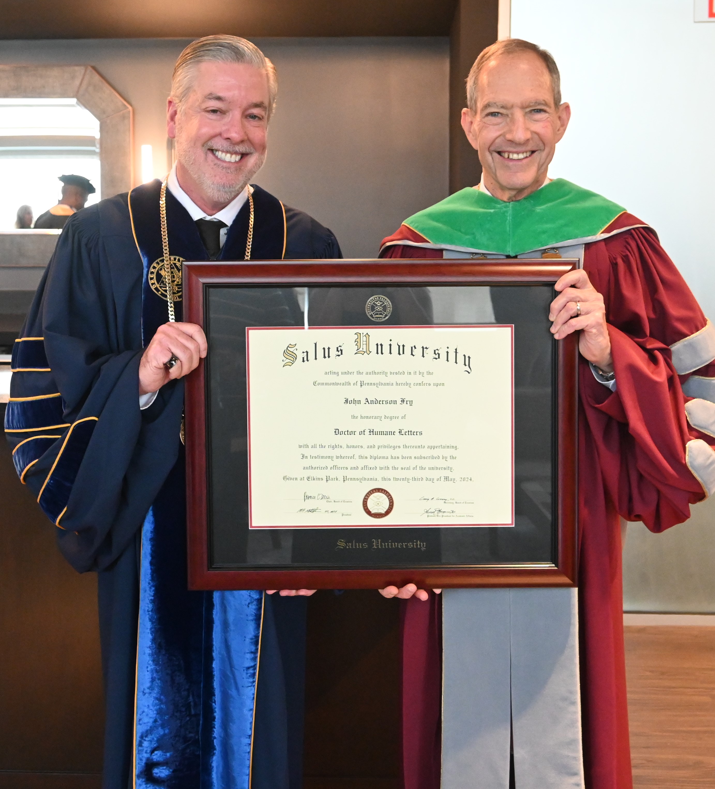 President Fry and MHM with award