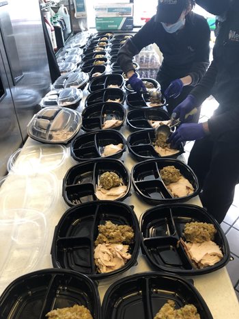 metz workers preparing meals