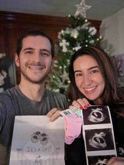 James and Areniah holding ultrasounds