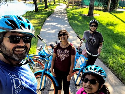 Dr. Jenny Rajan and family selfie with their bikes