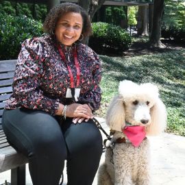 Lachelle and her guide dog Lyra headshot 