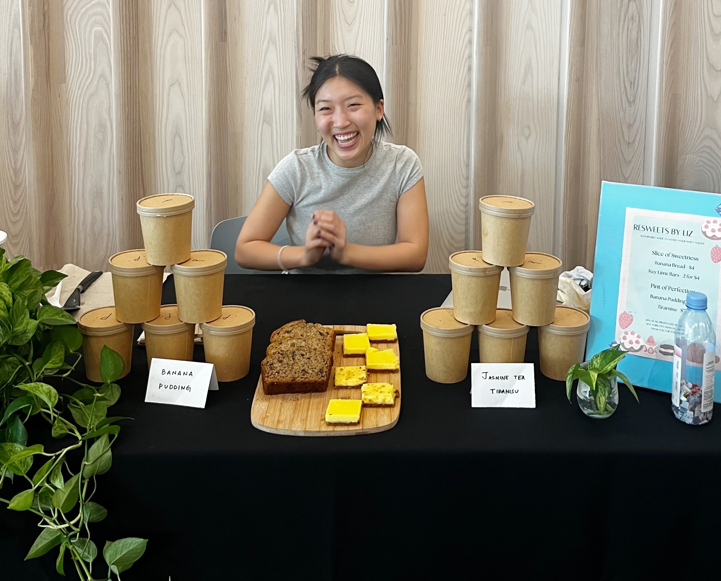 Liz Luan and her wares at table