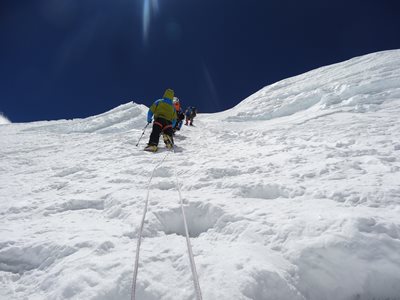 Michael Baertschi climbing a mountain