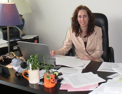 Melissa Padilla at her desk