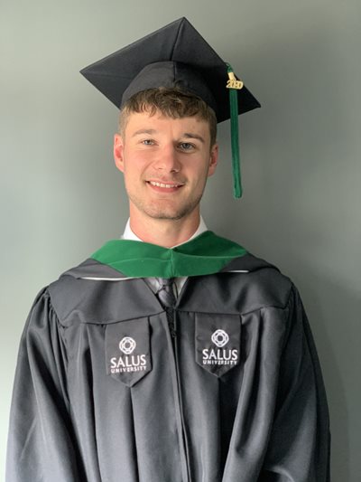 Nicholas Lord in his graduation regalia