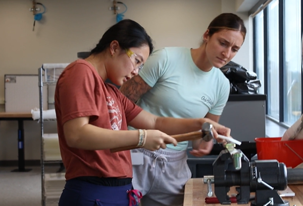 two students in the o&p lab