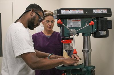 Julie Quinlan and Antonio Butler in the lab