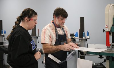 Dr. Duncan and student in lab