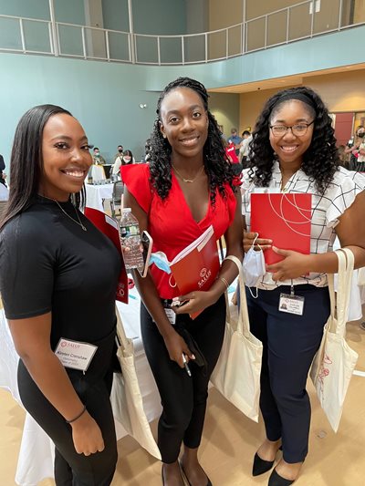 Three students group photo during orientation