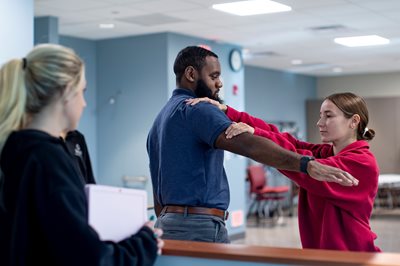 OT Student Helping a Patient