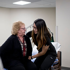 OT student helping patient