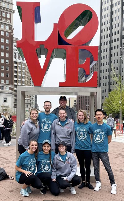 Salus PA students group photo in front of the "love" sign