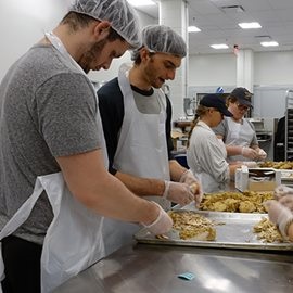 students volunteering at MANNA