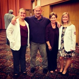 Salus students and parents at white coat