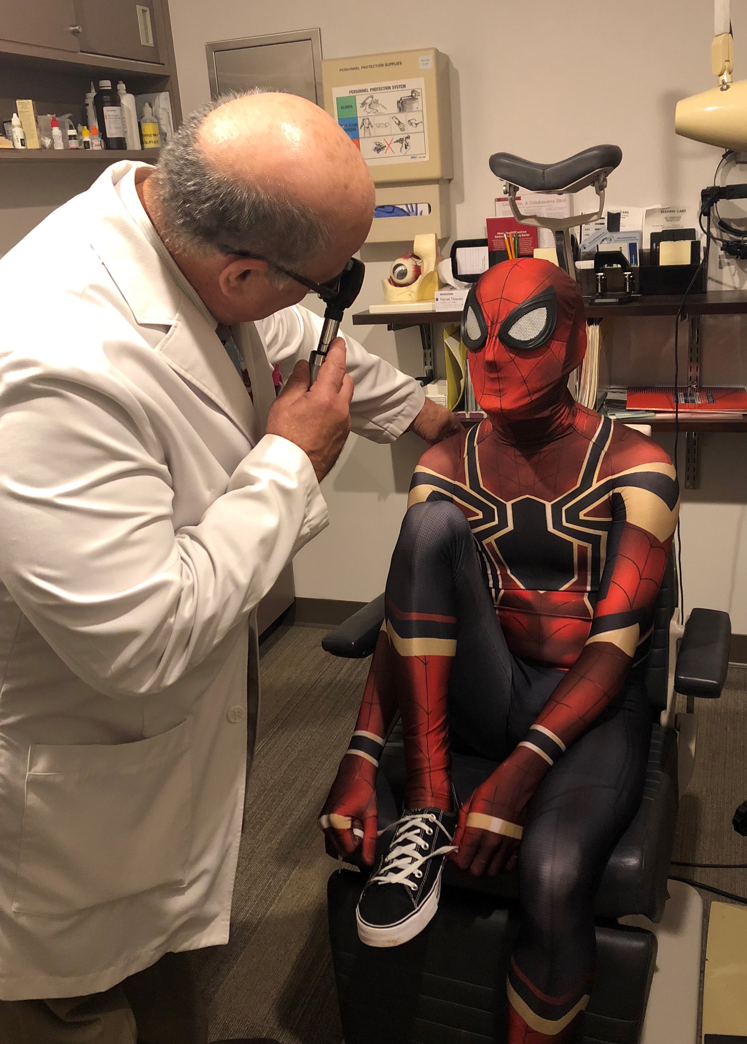 Dr. Paul Freeman examines Spiderman