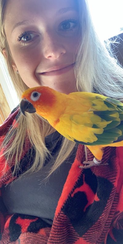 Chelsea Iaconianni with her bird Tiki