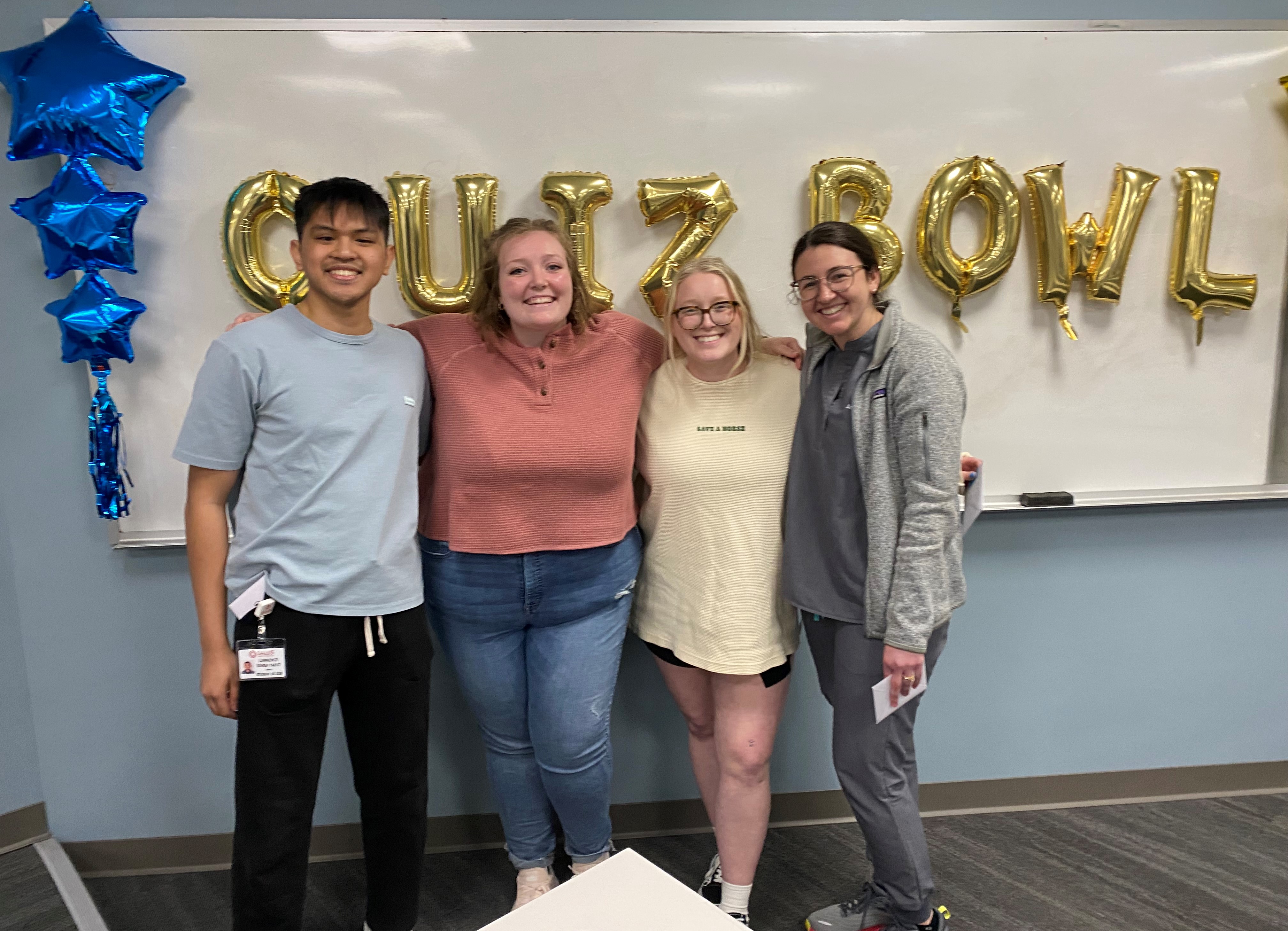 Four Quiz Bowl contestants