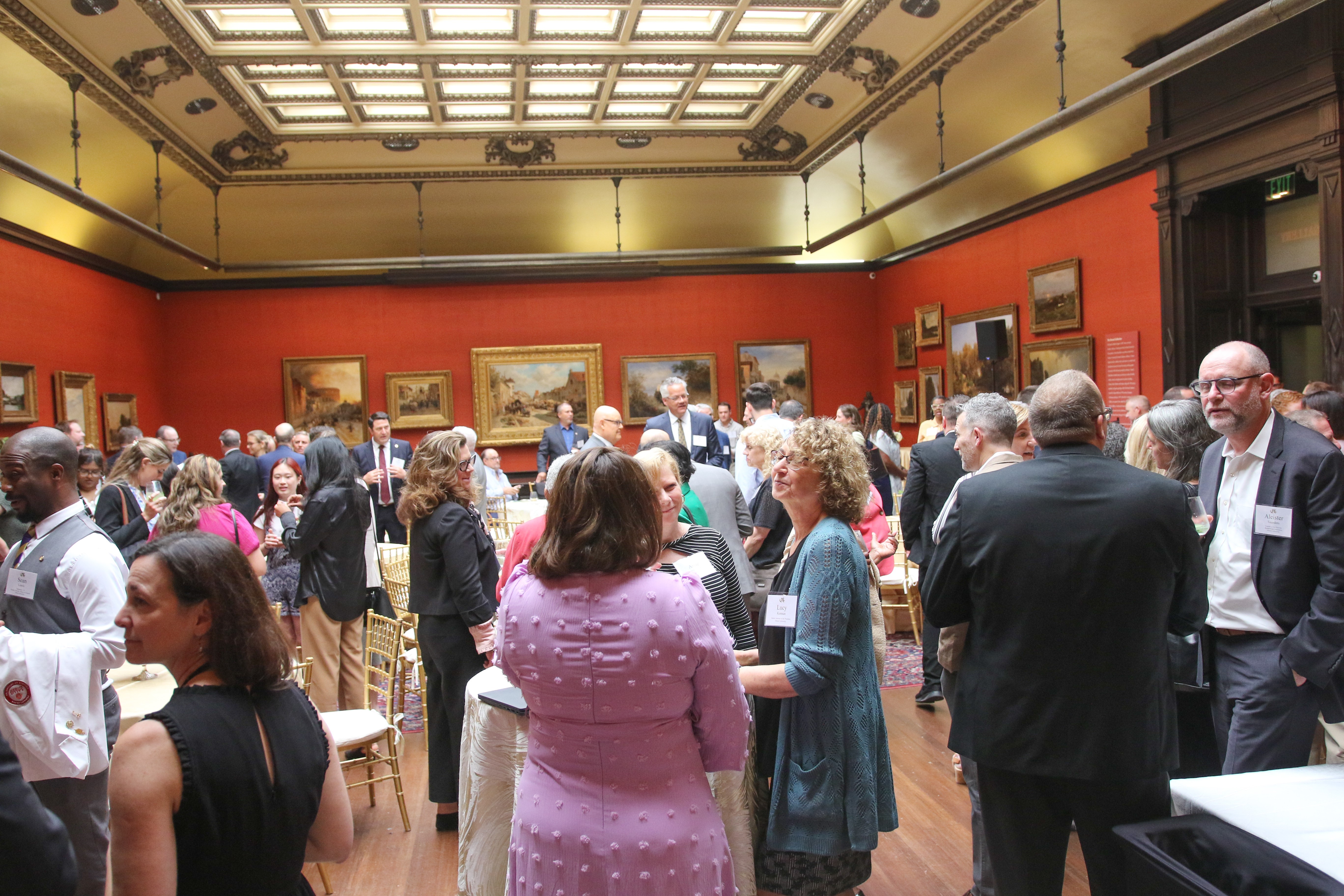 Crowd at ceremony signing