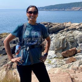 Dr. Shital Mani hiking near water