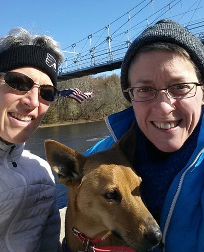 Stephanie Holt with her wife and dog