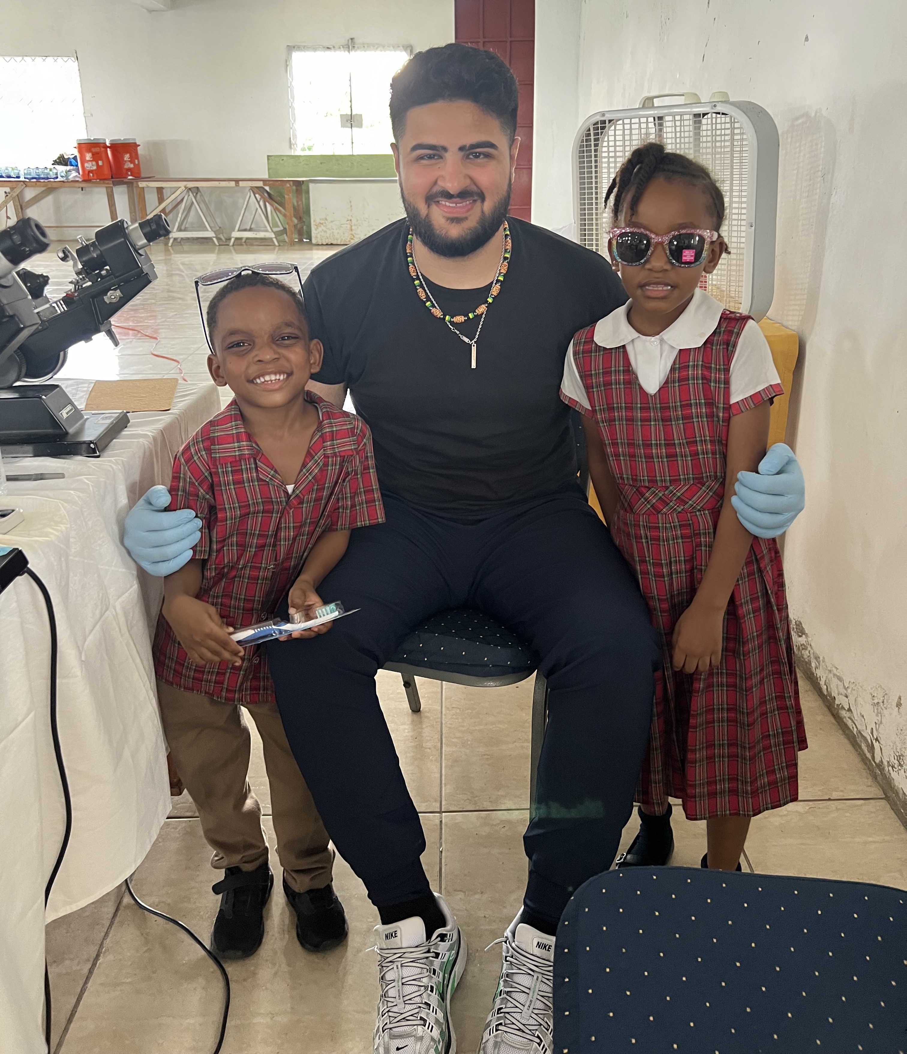 SOSH student with two Jamaican kids