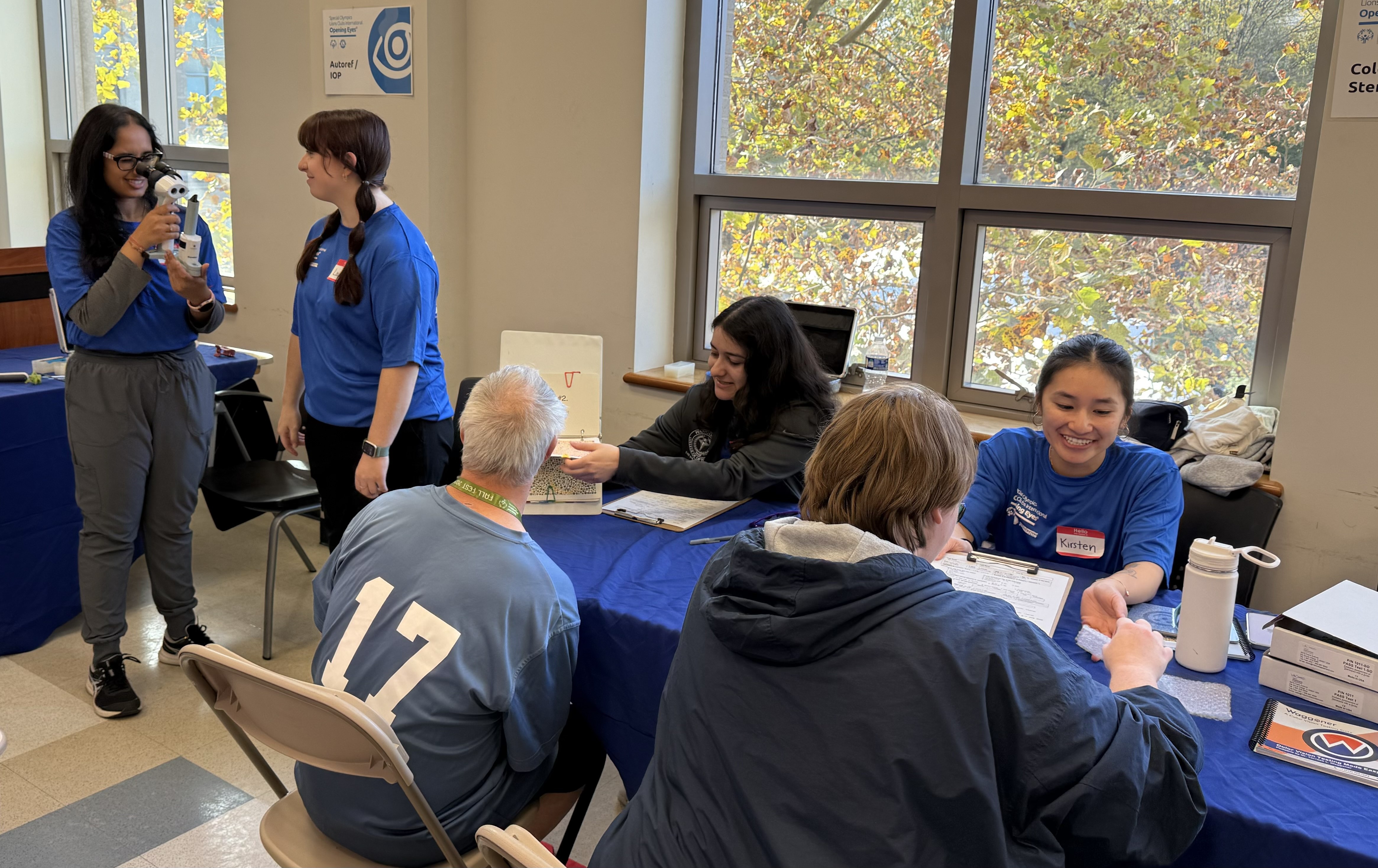 PCO students examining Special Olympics patients